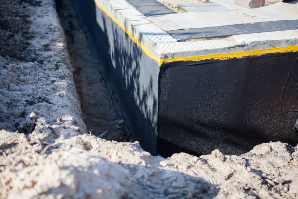 Professional Waterproofing technician working in Macy, IN